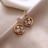 Boucles d'Oreilles Lune Chat Dorées - La boutique du Maine Coon
